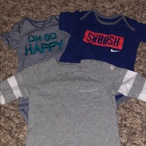 2 onesies and a long sleeve shirt